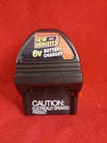 6V R/C battery charger with caution label and NEW BRIGHT logo