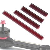 Four burgundy motor wire protection tubes, rectangular sleeves with open channel ends.