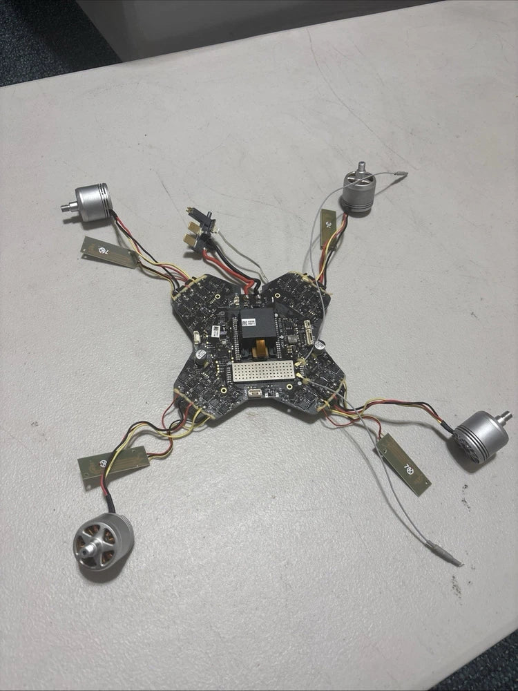 DJI Phantom 3 Standard mainboard assembly with four arms, motors, and wiring harness