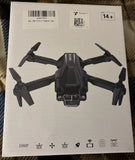 Black mini quadcopter drone with propellers and front camera