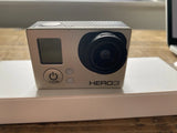 GoPro HERO3 silver action camera with front lens and mode button
