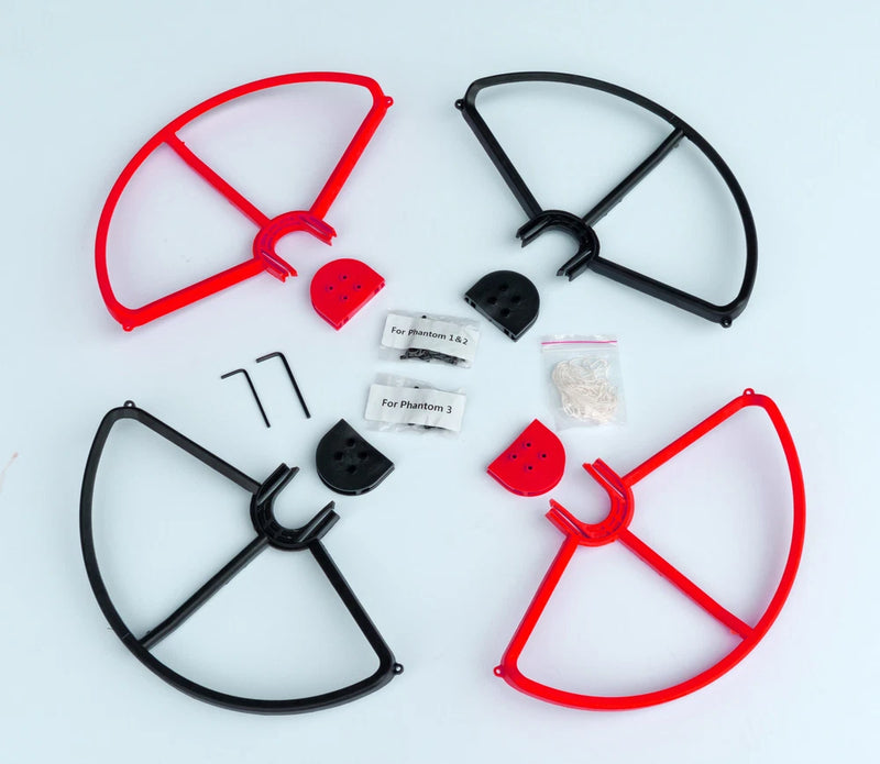 Red and black snap-on prop guards with quick-mount hardware for quadcopter props