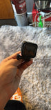 GoPro Hero Session 4 action camera in protective housing, held in hand