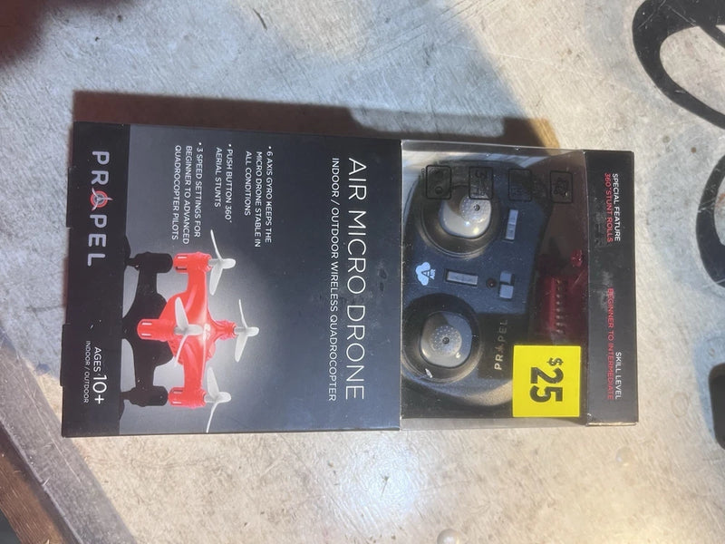 TESTED-WORKS Propel Air micro drone box with blue quadcopter