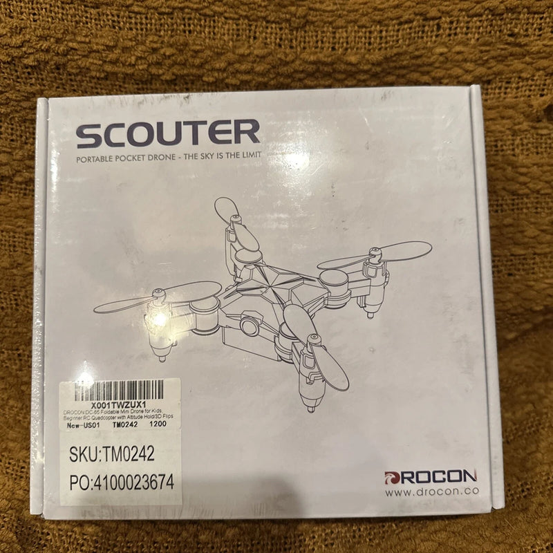 Mini RC drone retail box with Scouter branding and drone illustration