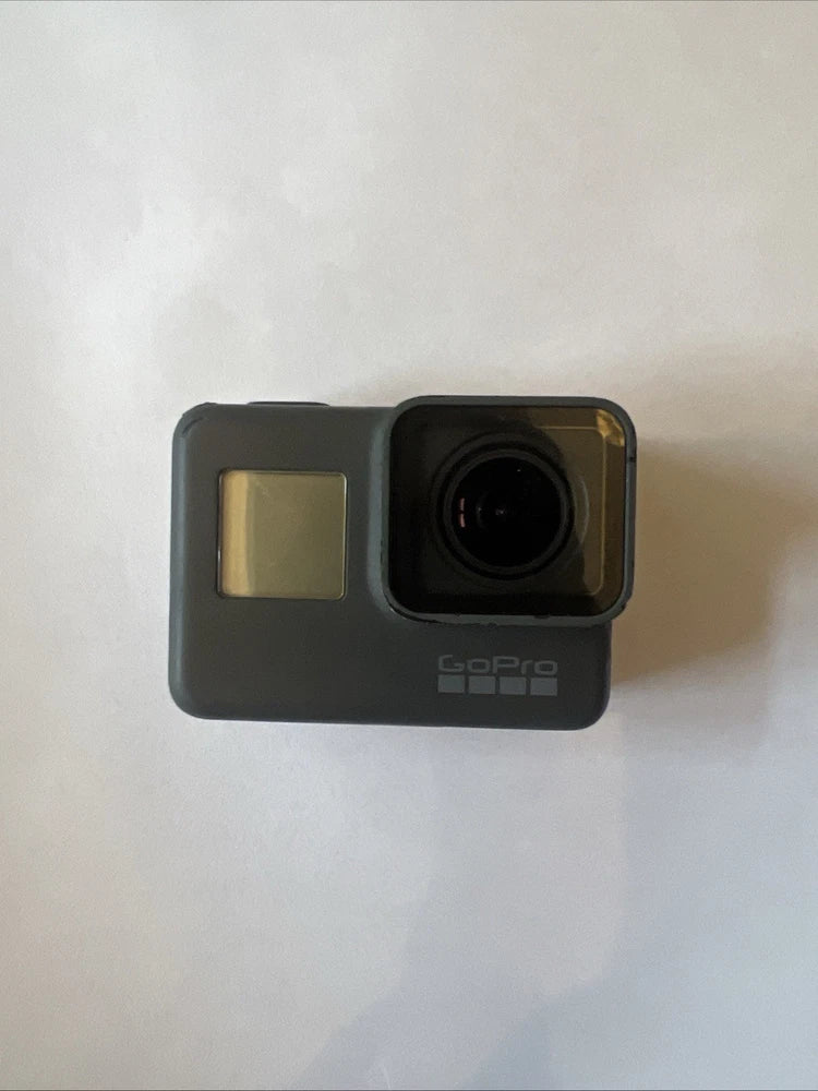 GoPro action camera with front lens and small display on dark case