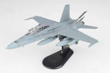 F/A-18B Hornet model aircraft in light gray on black display stand, side view
