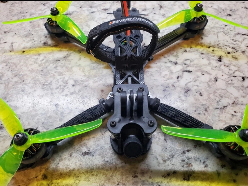 5-inch FPV freestyle drone with green propellers