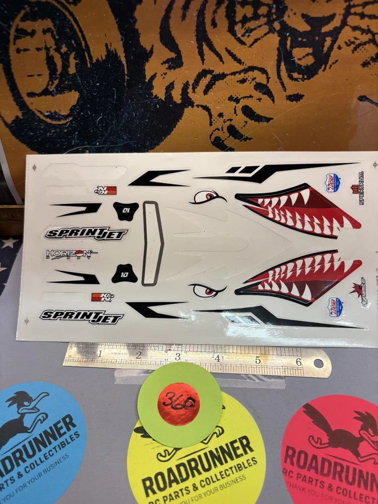 SprintJet jet decals sheet with black arrows and red shark-teeth graphics, small stickers