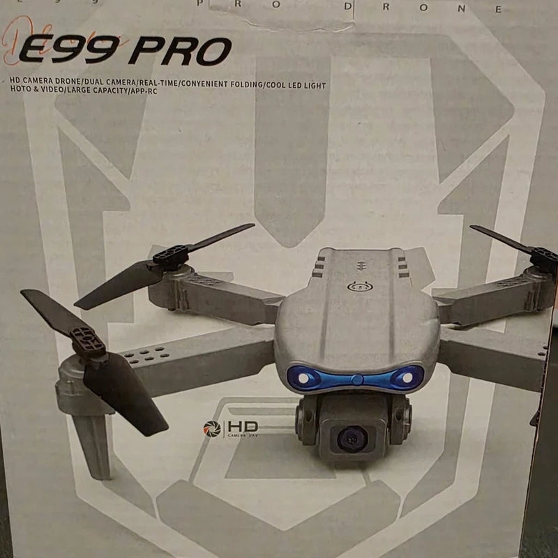 Folding quadcopter drone with front camera and blue accents, gray body and propellers