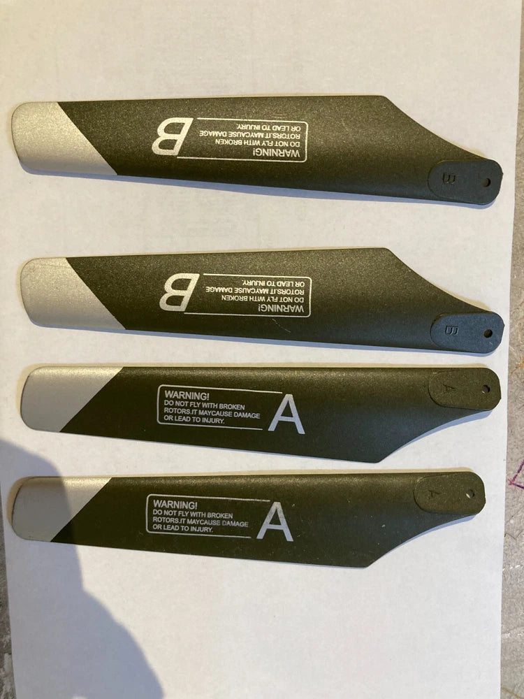 Green RC helicopter rotor blades set, labeled 2a and 2b, multiple pieces