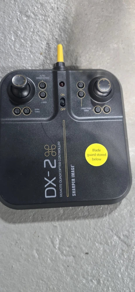 Sharper Image DX-2 drone remote controller with two joysticks and yellow antenna