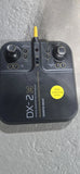 Sharper Image DX-2 drone remote controller with two joysticks and yellow antenna