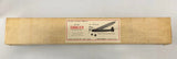 Vintage free-flight model kit in long cardboard box with Cavalier label