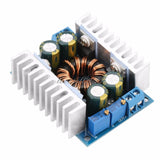 Automatic DC step up/down converter module with blue PCB and metal heatsinks