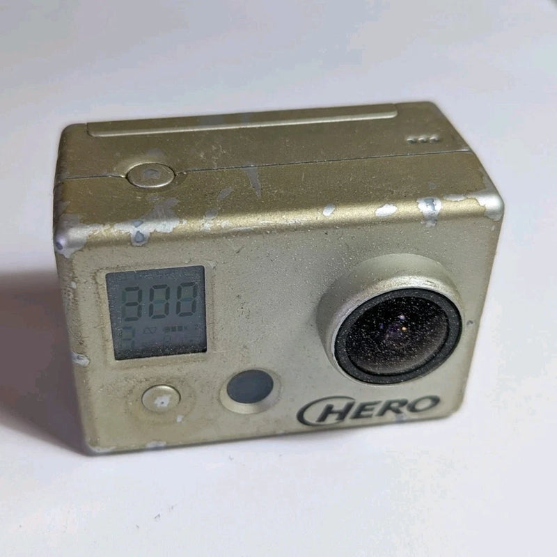 GoPro HERO action camera front view with LCD screen and wide lens, silver