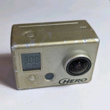 GoPro HERO action camera front view with LCD screen and wide lens, silver