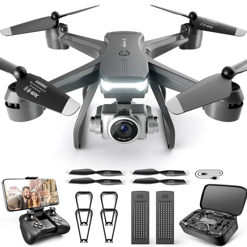 Gray quadcopter drone with front dual camera, four propellers, controller and carry case