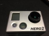 GoPro HERO2 action camera front panel with lens mount opening and display