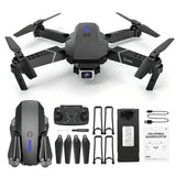4K dual-camera drone kit with controller, propellers, battery, and carrying case