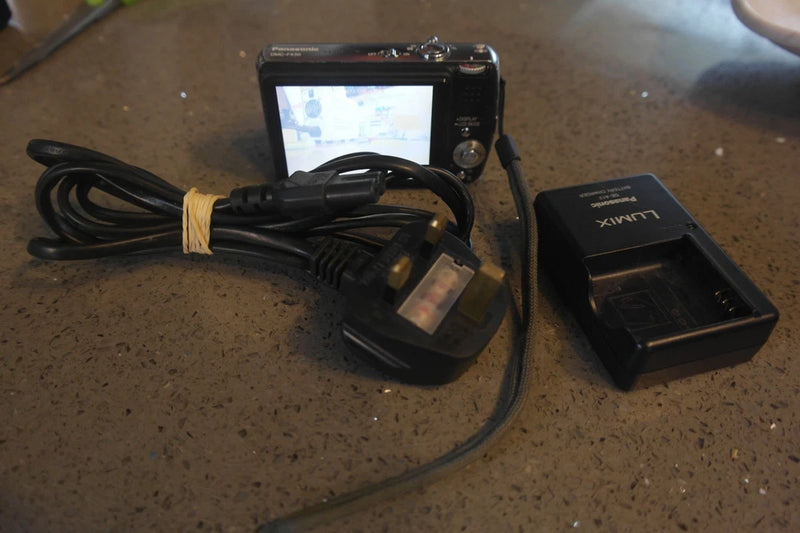 Panasonic LUMIX DMC-FX50 7.2MP Digital Camera  and accessories