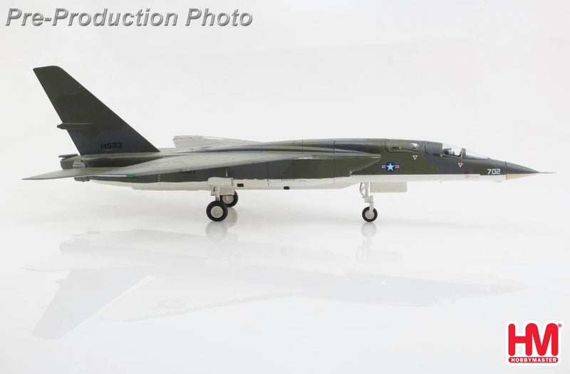 1:72 scale gray and white jet model aircraft with landing gear down, side view