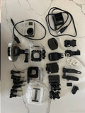 GoPro HERO3 action camera kit with waterproof cases and multiple mounting accessories