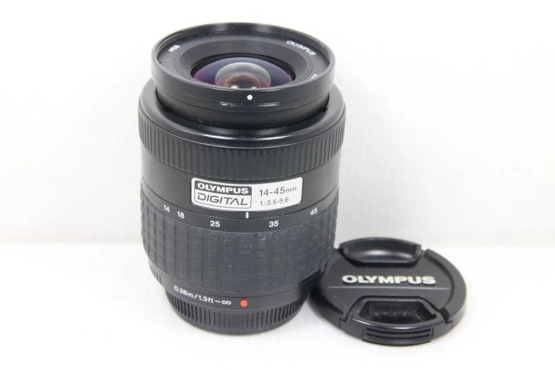 Used Olympus ZUIKO DIGITAL 14-45mm f/3.5-5.6 camera lens with front cap