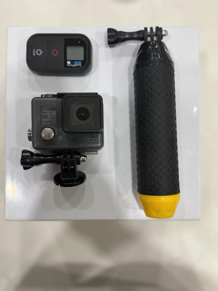 GoPro HERO+ action camera with side view and mounting base, plus handheld grip