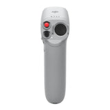 DJI drone motion controller, gray handheld with red button and speaker grille