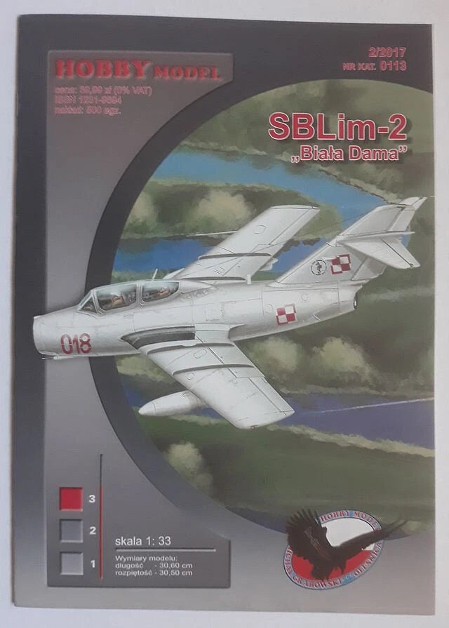 Model airplane kit box with white and gray jet trainer on illustrated cover art