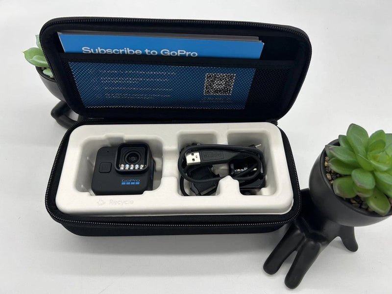 Mini sport action camera in zip case with mount and cable