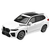 White 1/24 X5 M diecast model car with black wheels, front three-quarter view