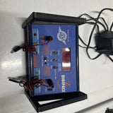 Blue and black RC battery charger with display and connected power cables