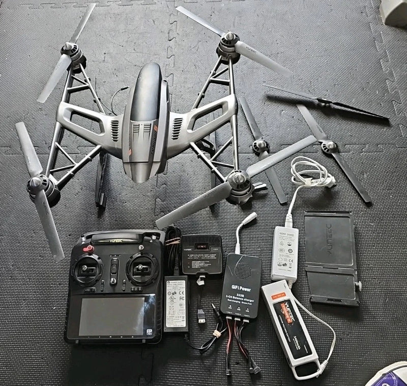 Yuneec Typhoon G drone with controller, batteries, and power accessories (for parts)