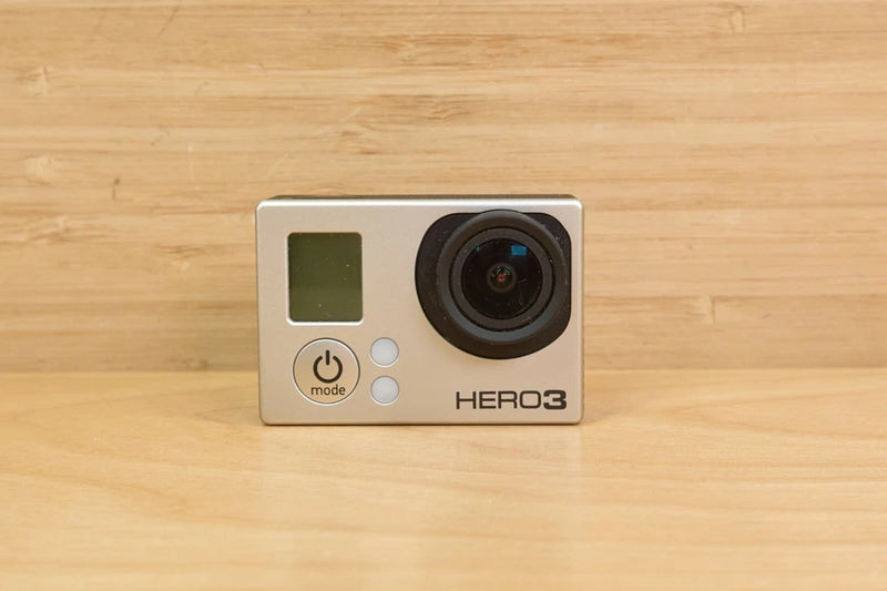 GoPro HERO3 Black Edition action camera, silver front with LCD screen and wide lens