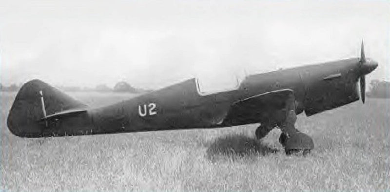 Dark gray wooden model airplane with U2 marking and three-part landing gear