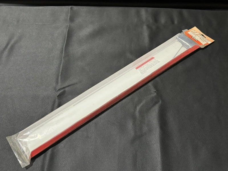 Vintage Kyosho RC helicopter main rotor blade in white/red packaging, 530mm