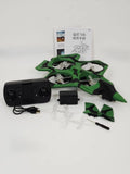 Green quadcopter jet drone with FPV camera module and spare propellers, includes controller