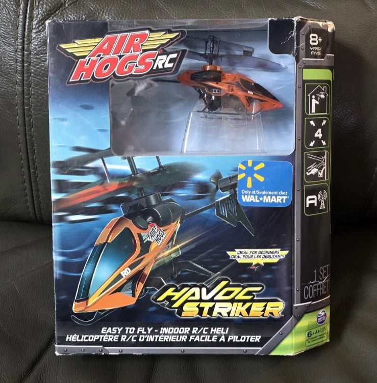 Orange Air Hogs RC Havoc Striker indoor helicopter in retail box packaging