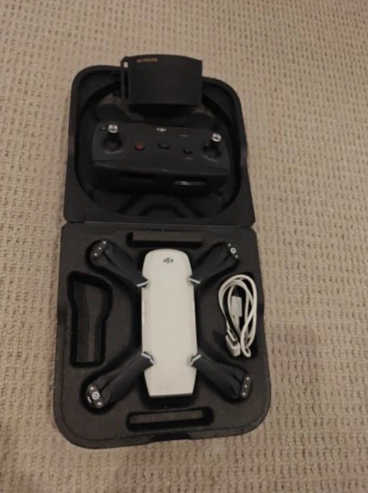 DJI Spark drone with remote controller accessories in black hard case