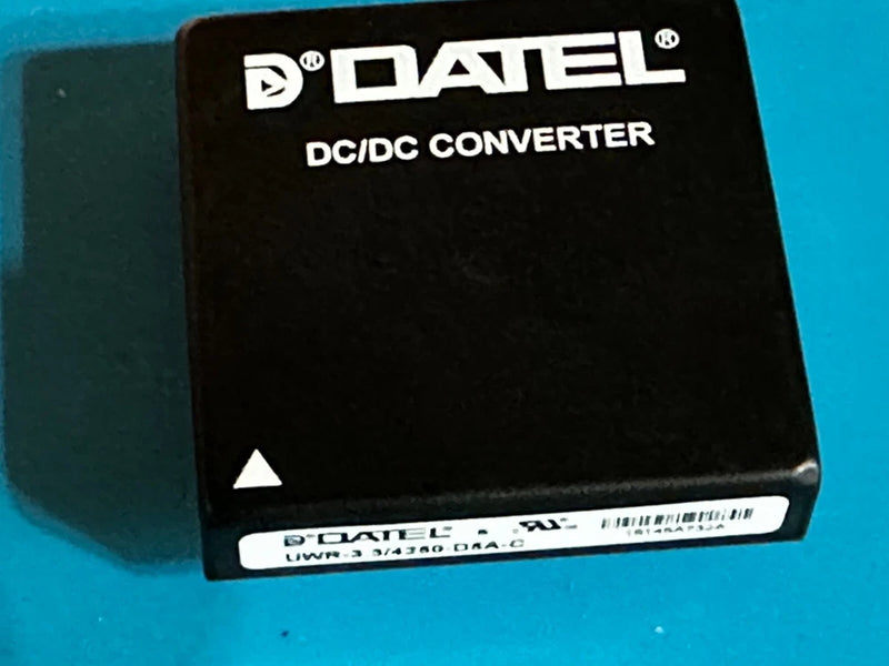 Black Datel DC/DC converter module with front label and logo