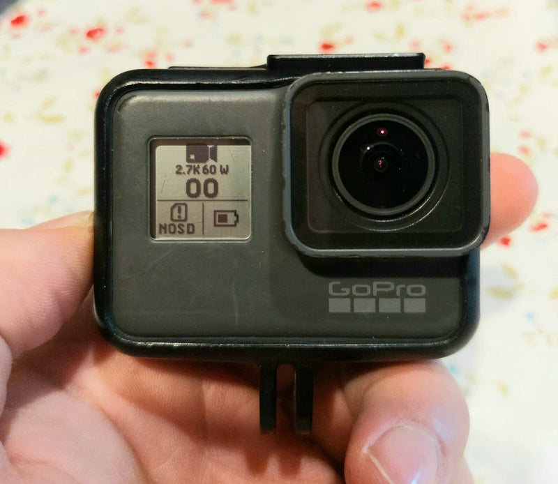 GoPro HERO5 Black action camera, front lens and status screen visible, black housing