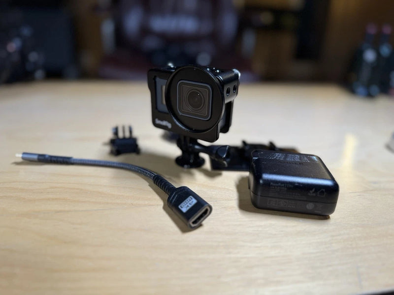 GoPro Hero 6 Black action camera with small rig mount and cables