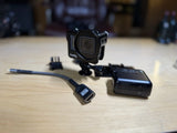 GoPro Hero 6 Black action camera with small rig mount and cables