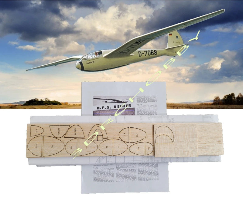 RC free-flight glider kit with balsa wood sheets and instruction papers