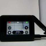 GoPro 8 action camera with touchscreen displaying activity stats