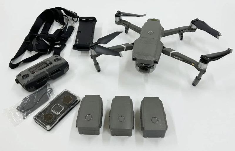 Drone accessories kit with foldable drone, remote controller, charging case, four batteries