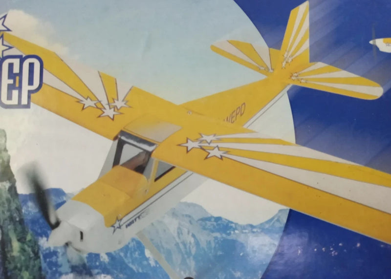 Yellow electric RC plane with star decals, wing and tail visible