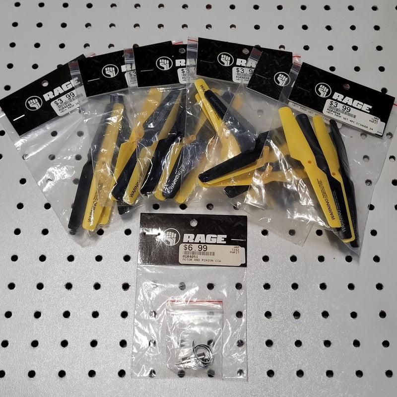 Rage RC drone propeller and motor parts lot with yellow blades, in sealed bags
